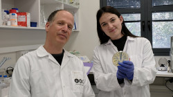 Research demonstrates just how viruses infect us. Left to right: Prof. Avigdor Eldar & Polina Guler. Courtesy of Tel Aviv University